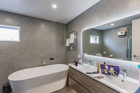 Ploceus Build - The house in hobsonville Bathroom View